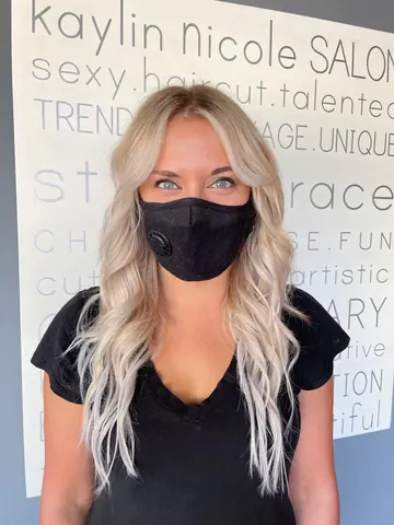 Long icy-blonde waves by Tian, Olympia-area hair stylist